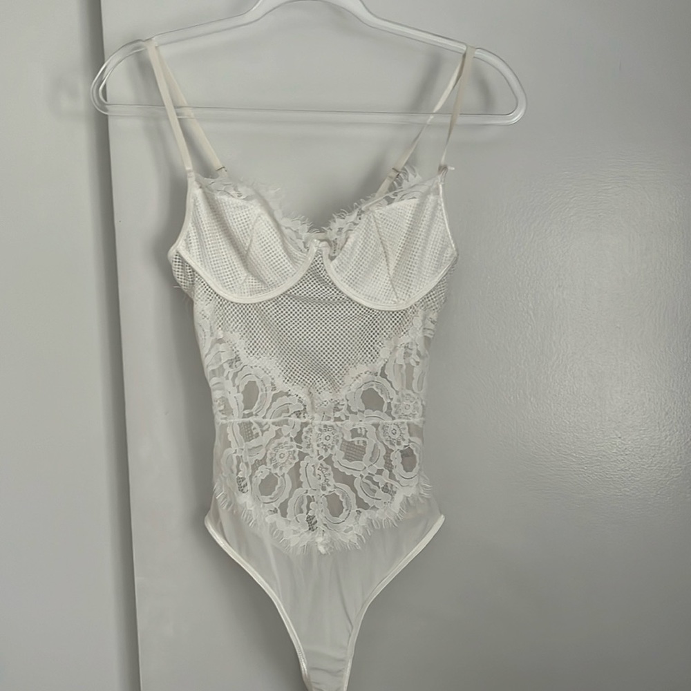 white delicate lace bodysuit